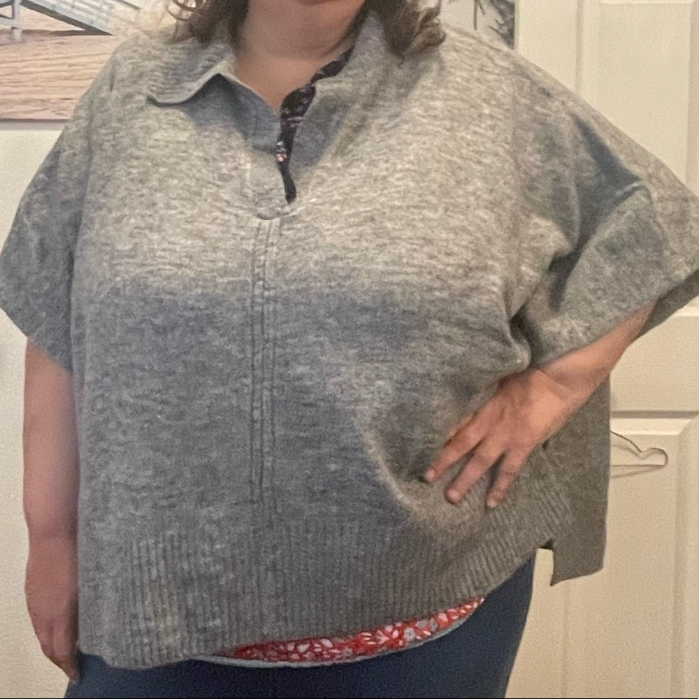 A new day   OSFM gray poncho type sweater.  NWT.  Made with recycled polyester